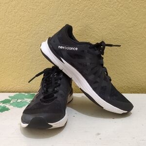 New Balance Black and White Athletic Shoes with Lace-Up Design